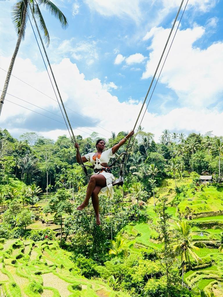 a woman on a swing